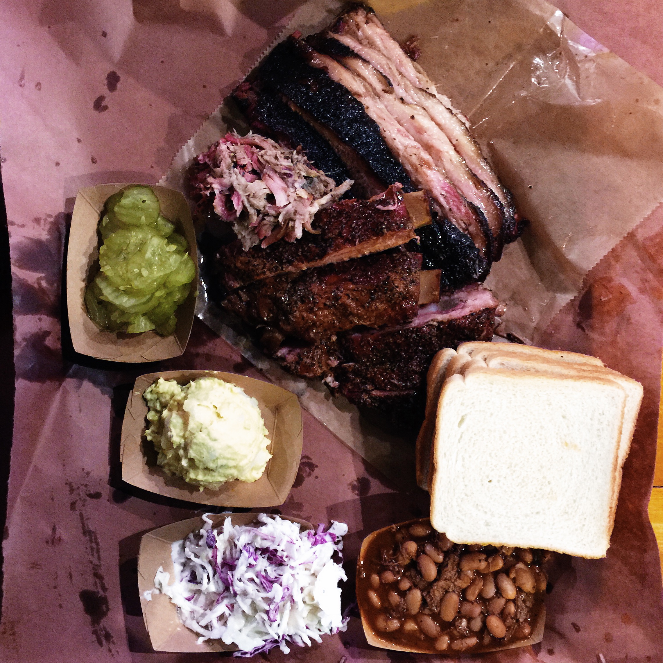   {brisket, ribs, pulled pork, pickles, pinto beans, coleslaw, &amp; potato salad.}  