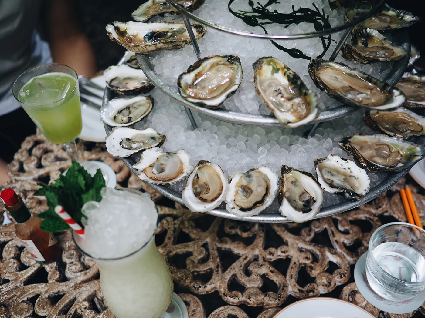 {Oyster tower and Absinthe cocktalis}