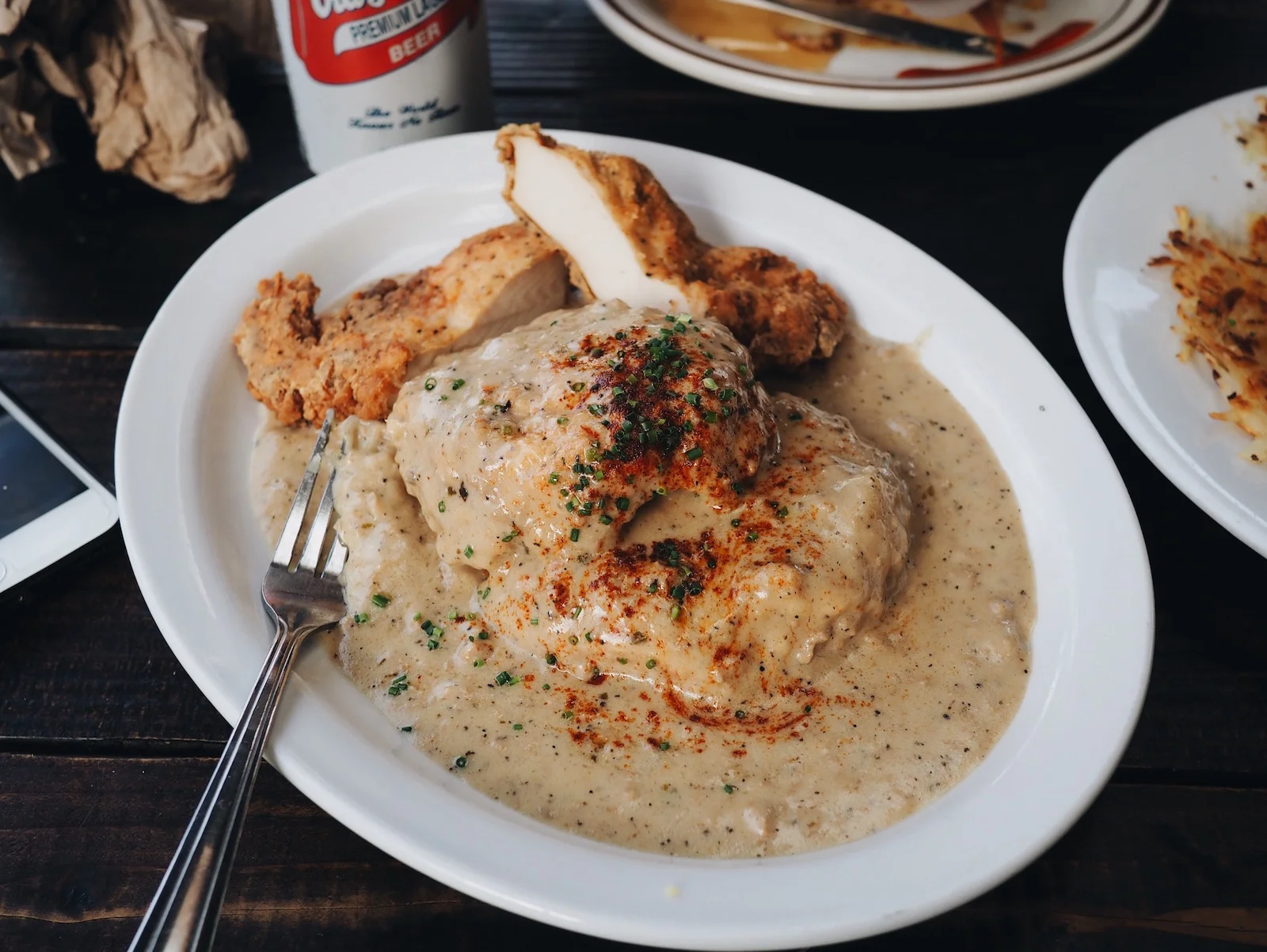 {Biscuits & gravy with fried chicken.}