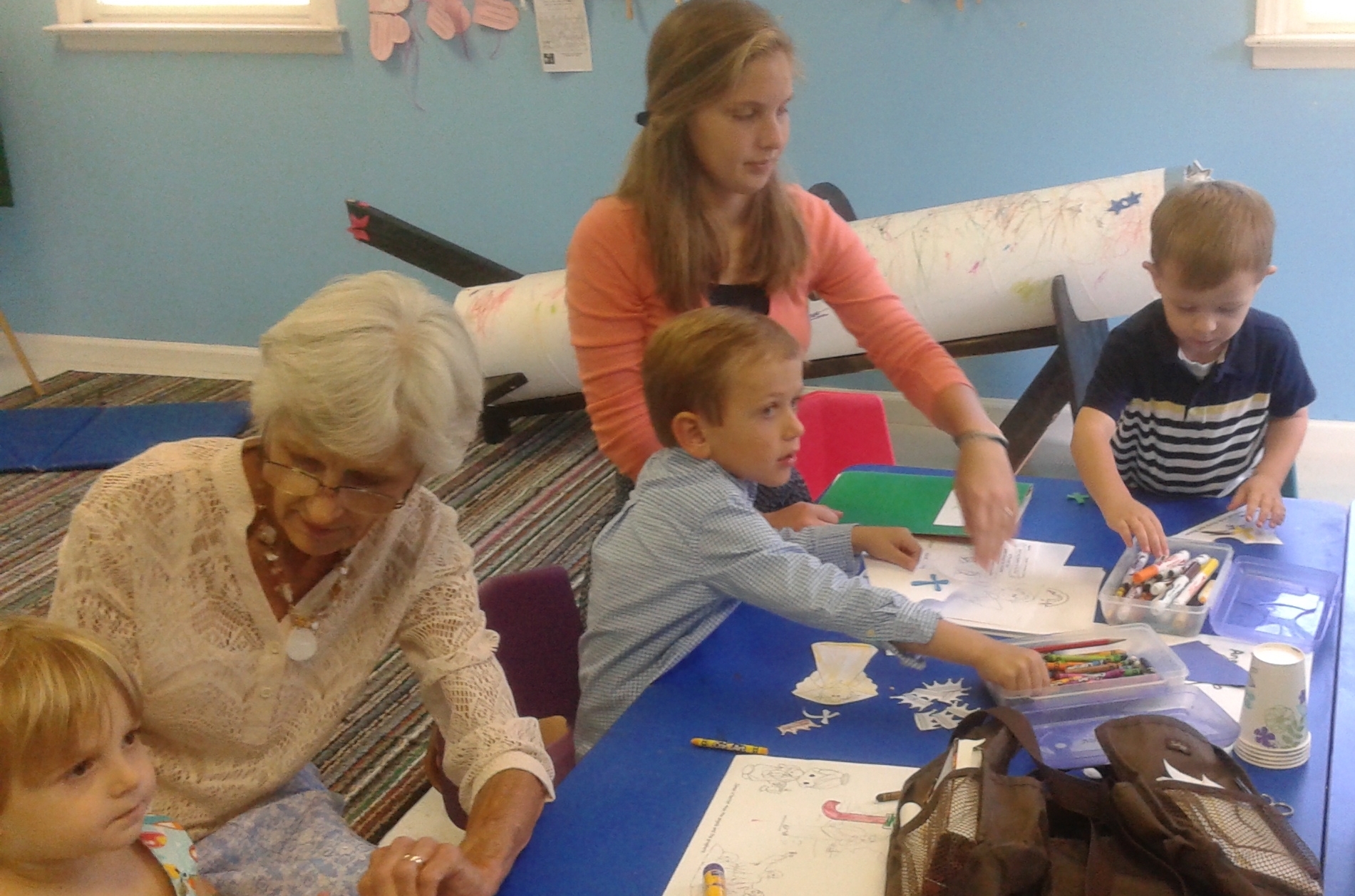 Preschool making crowns.