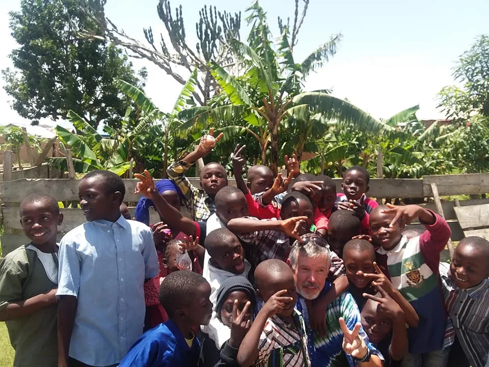 Kwashi kids loving on uncle Steve.jpg
