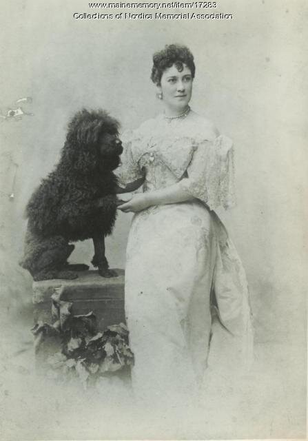  Lillian with her beloved poodle, Turk, who accompanied her around the world.  
