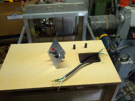The power cord to the shop vac is long, so I cut it in order to wire the vac into the controls and to provide the power cord for the entire vacuum former.