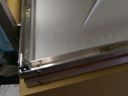 Magnets affixed with J-B Weld (corner) and 5 minute epoxy (front & side)