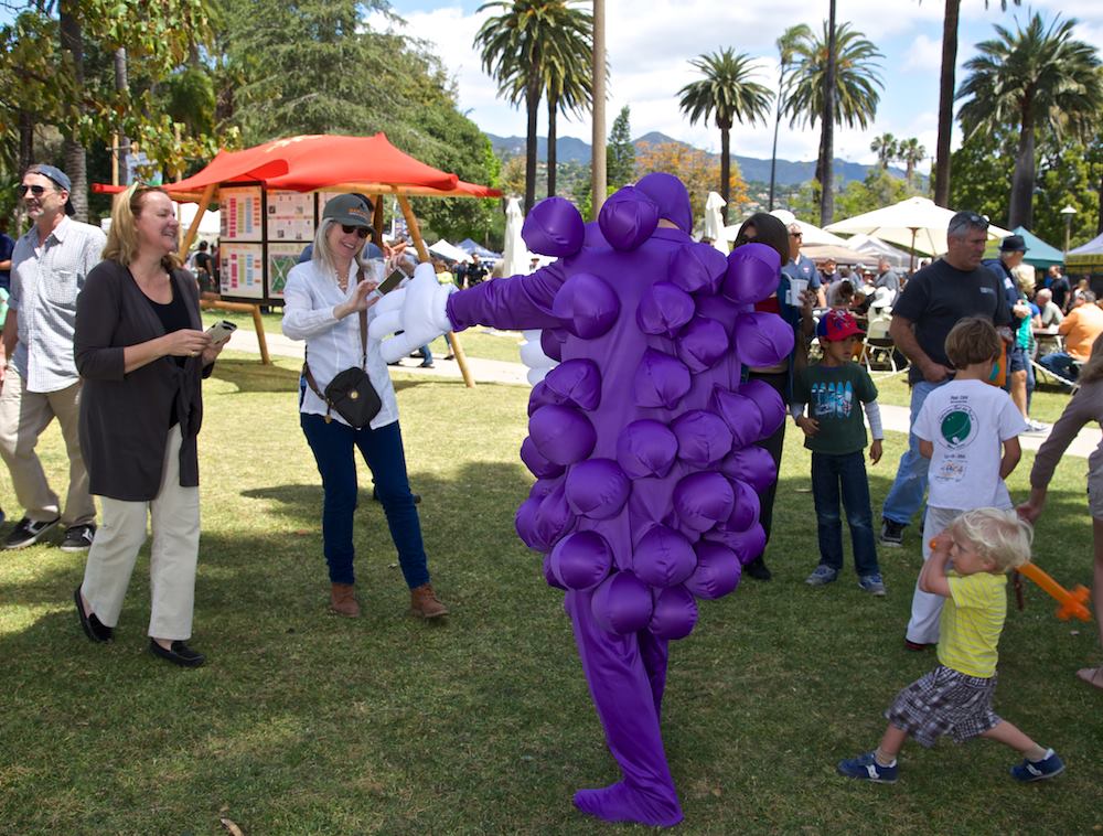 I had a great time interacting with the crowd, and the kids loved it - like the one you can see on the right side of the photo about to whack me with his balloon sword.