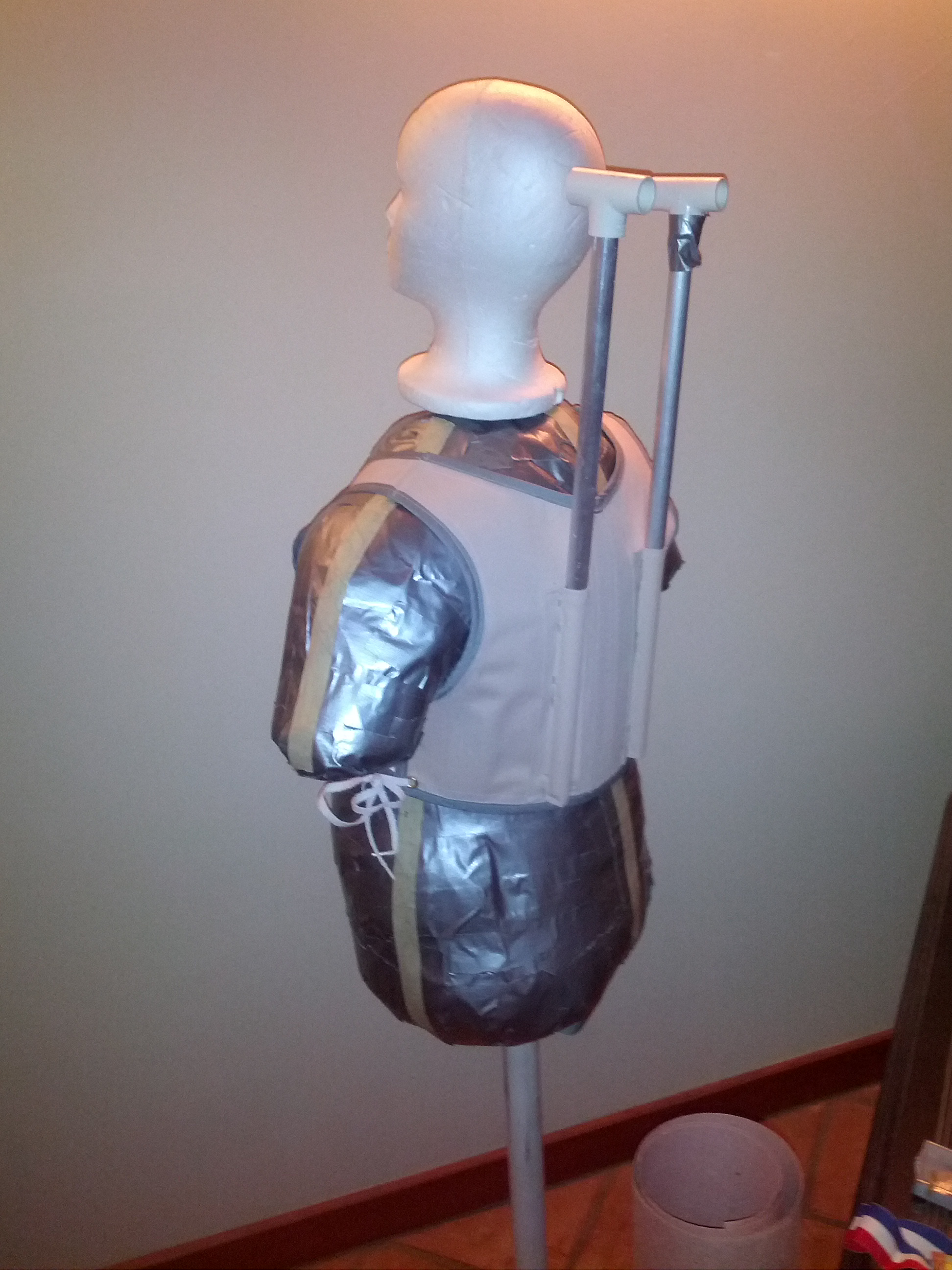 Back of corset showing mounting pockets