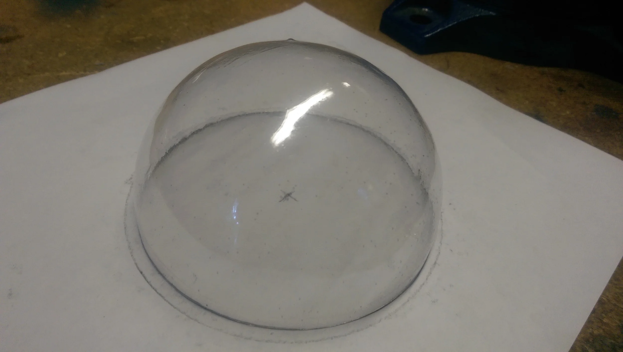 Final clear plastic dome for one eye.