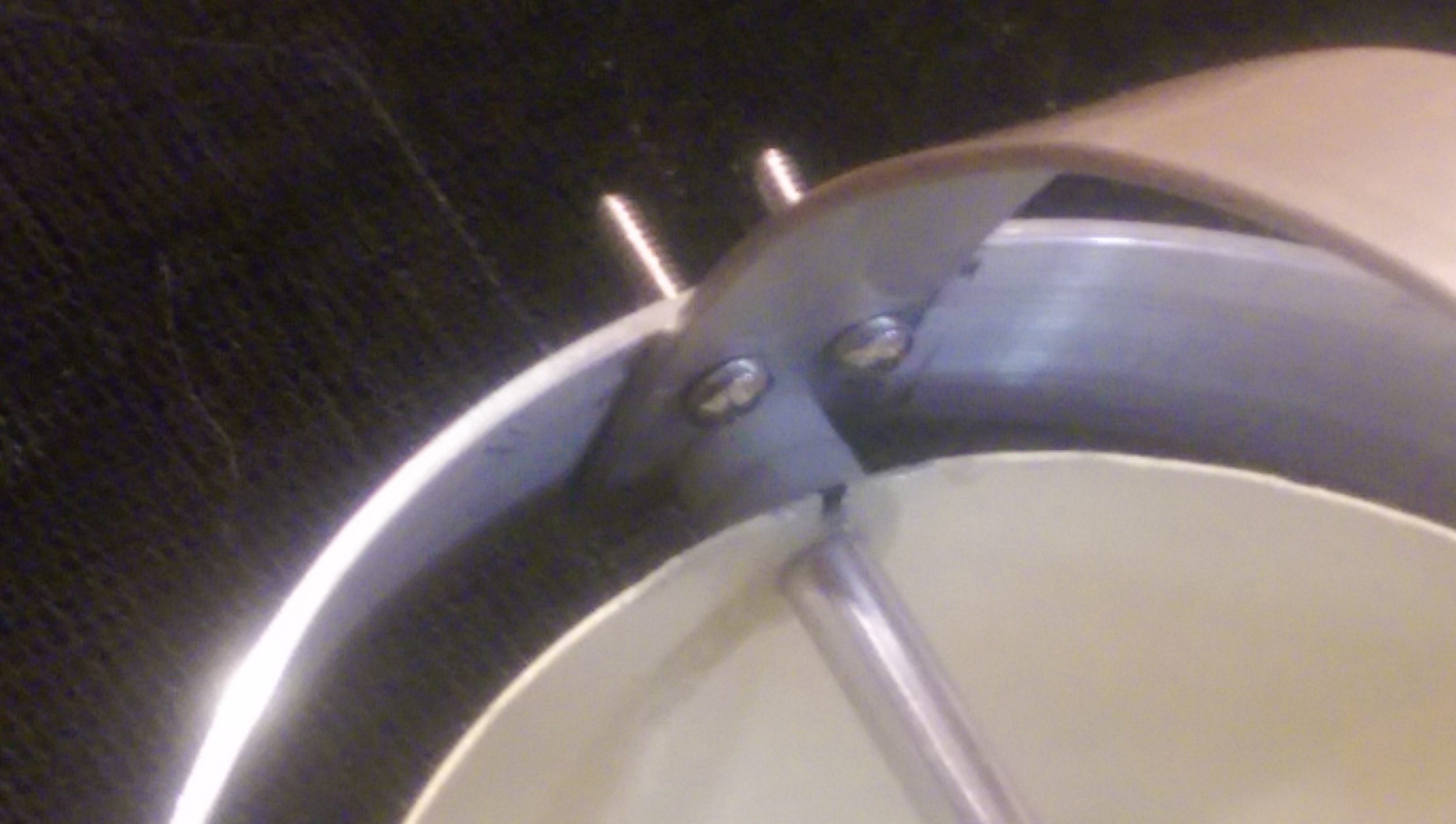 One end of eye pivot and the back half ring support