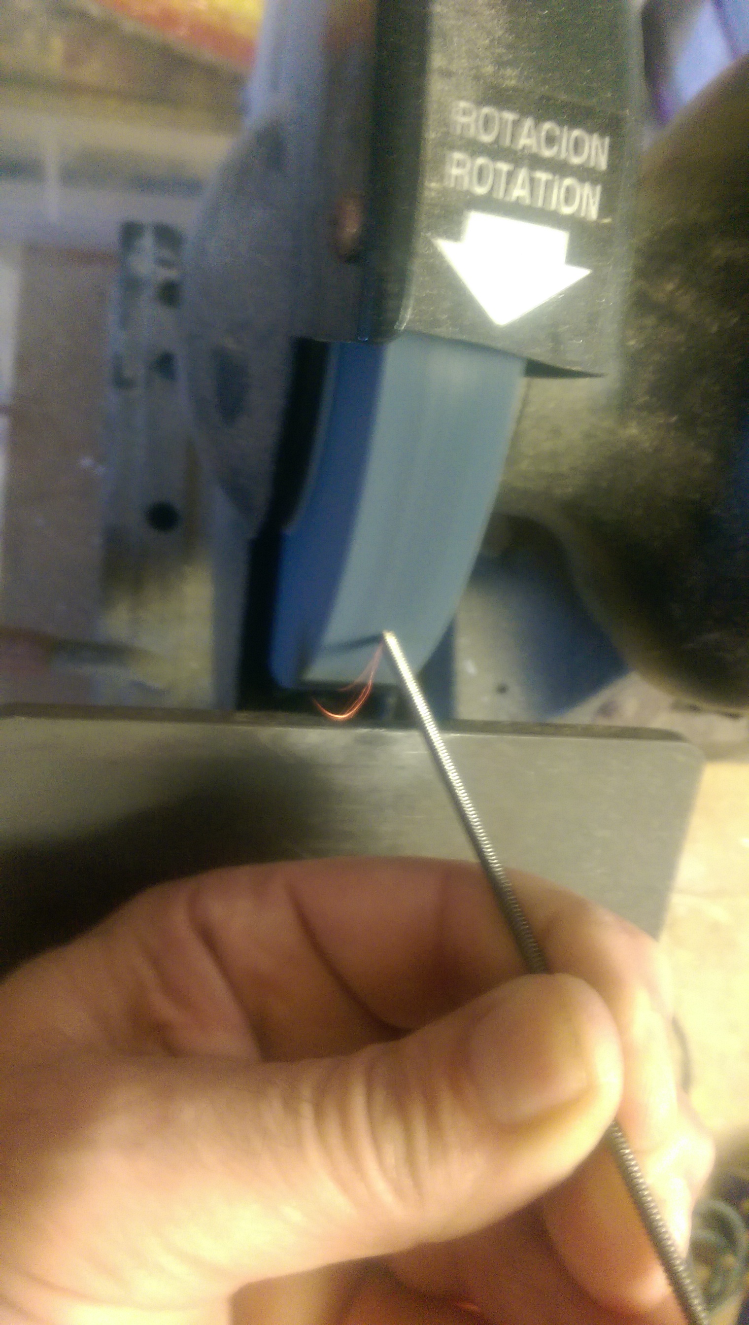 Cleaning up the ends (really, I just wanted to get a shot of grinding steel with sparks flying)