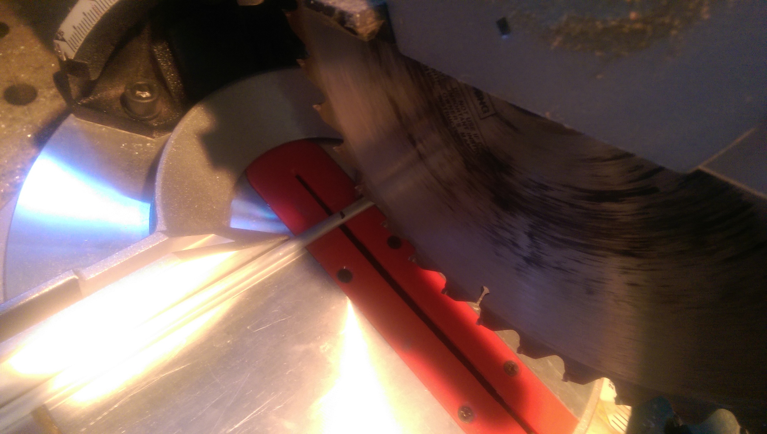 My chop saw cuts the aluminum rod to length