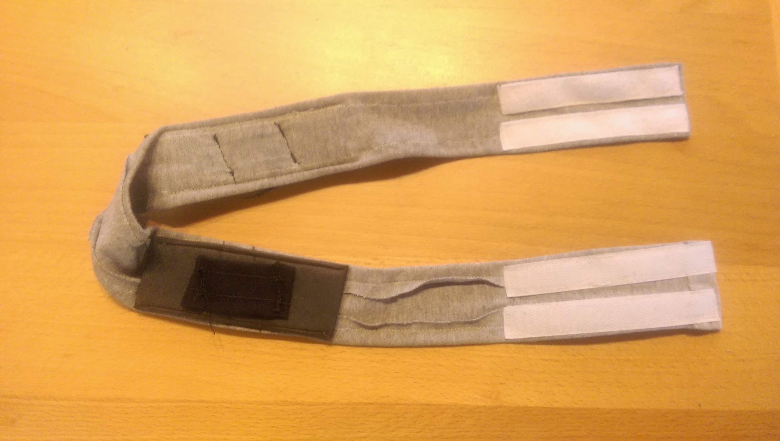 Finished headband showing the Velcro fasteners and the padded straps that wrap around the lever arms