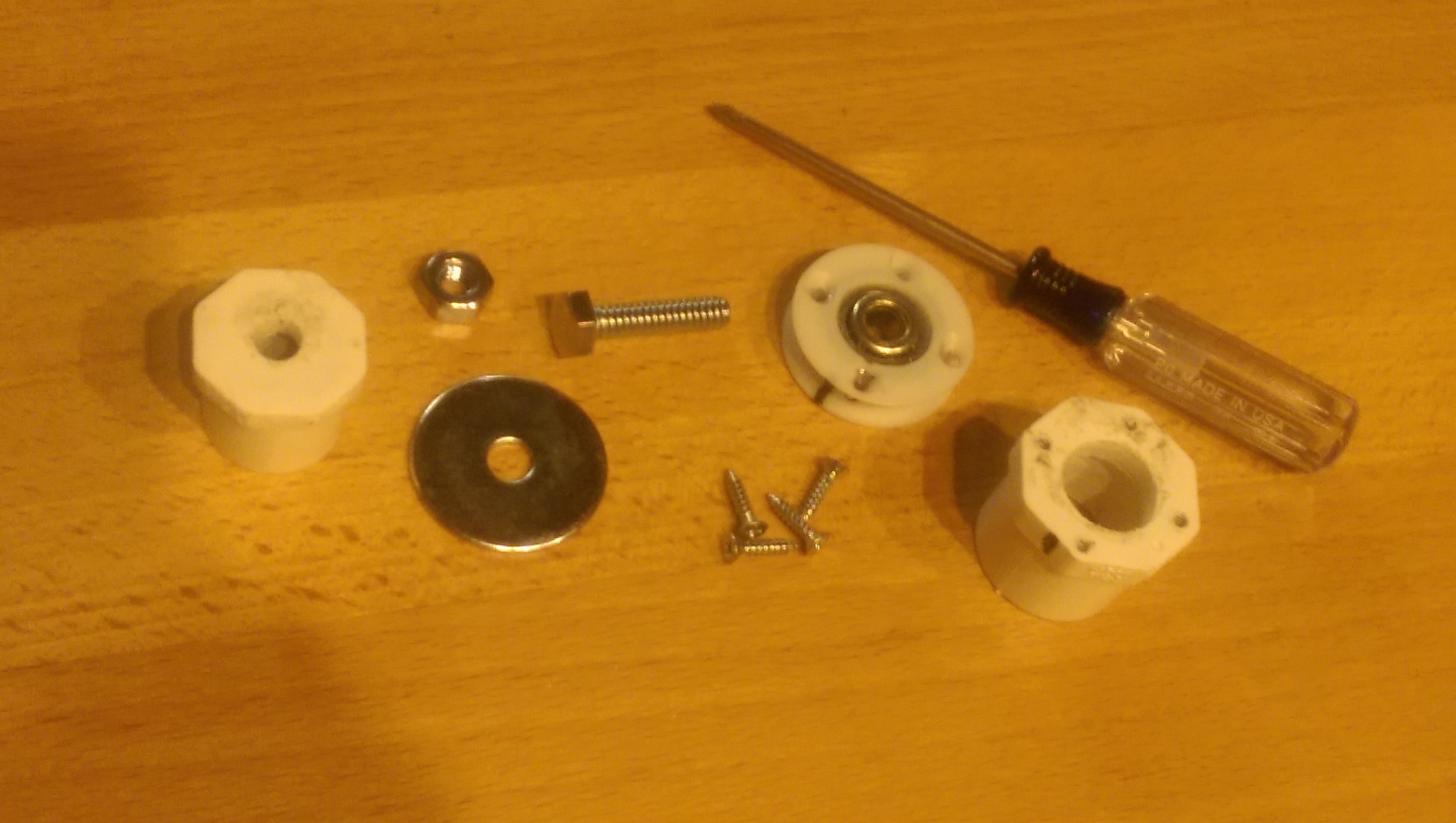 The final set of parts for the joint. A clearance hole for the bolt has been drilled into the smaller end cap