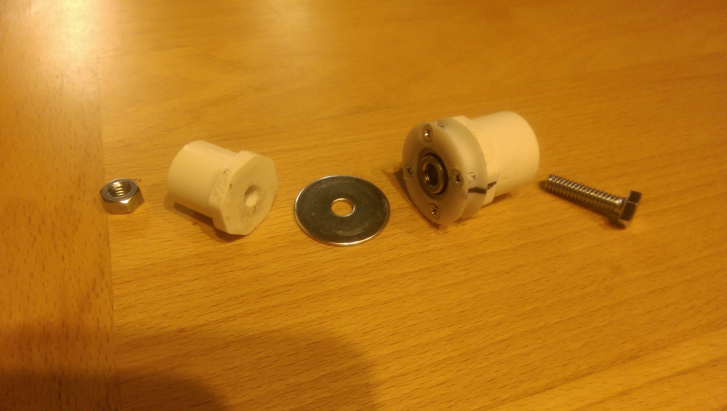 The smaller end cap will be bolted to the inner bearing ring