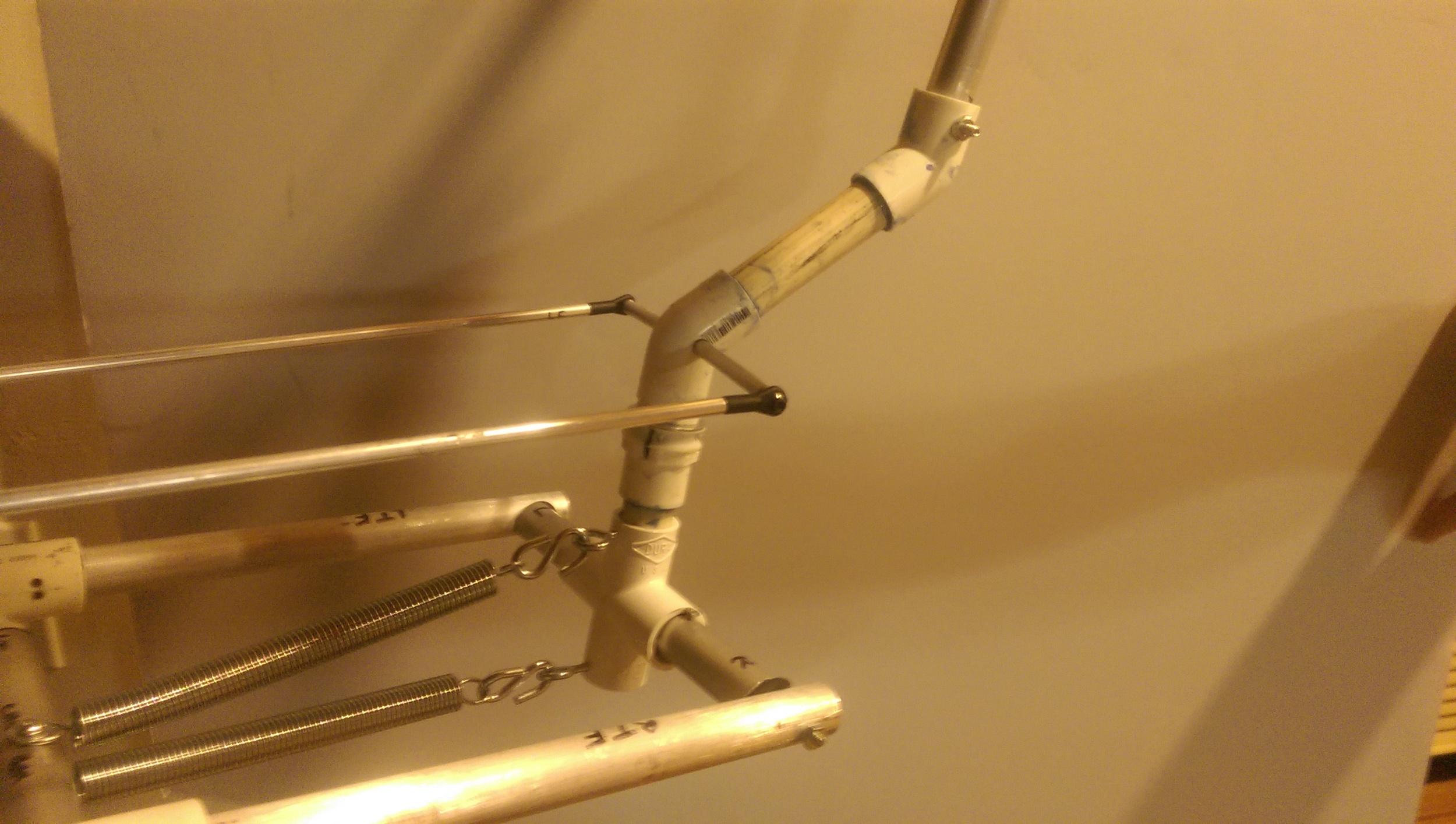 The neck and new joint are installed back onto the base structure along with all of the other improvements. You can see that the steering bar on the new joint is now higher, making the push rods and the horizontal support tube farther apart.