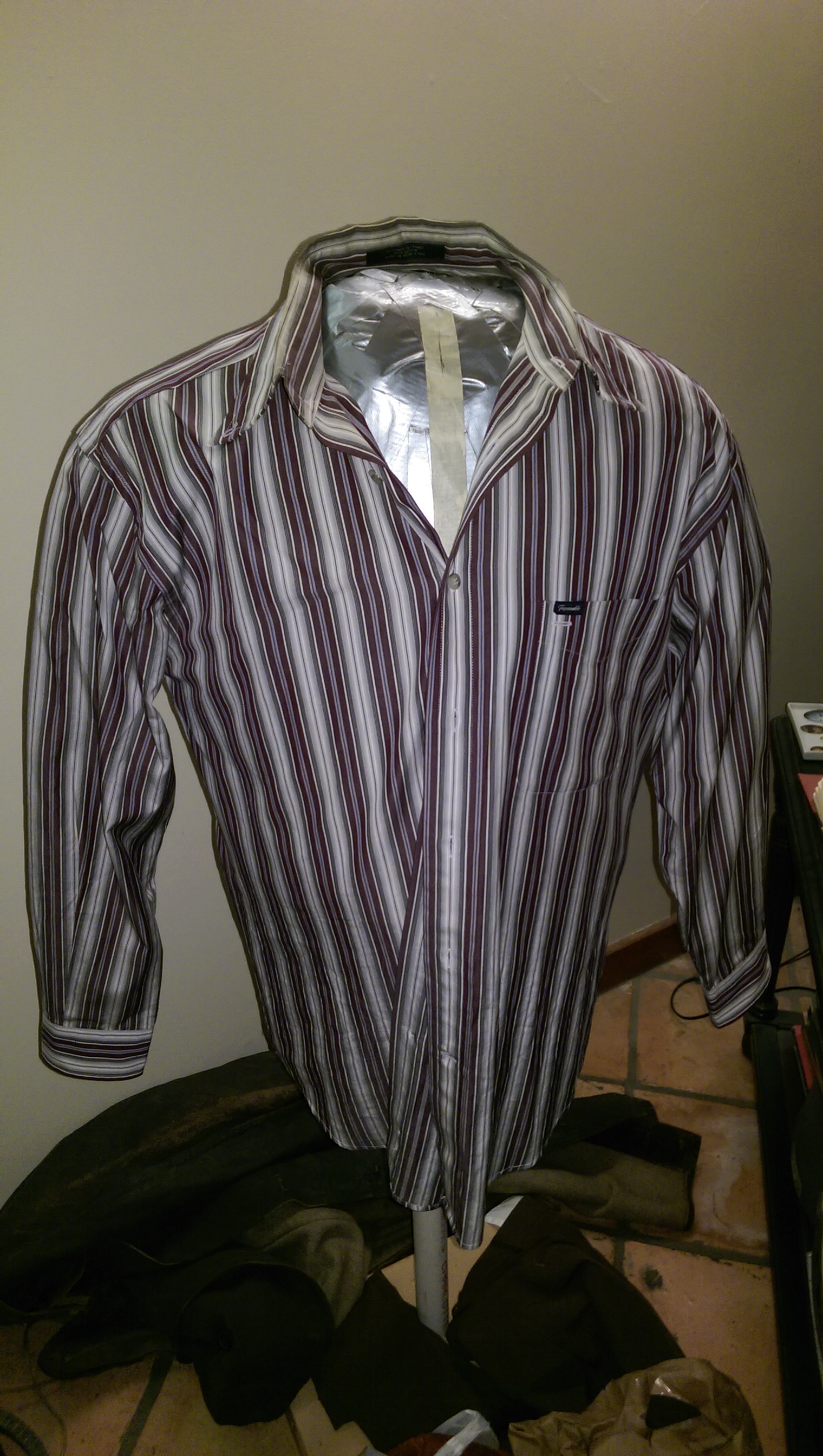 A stripped shirt from the thrift store which also needs some weathering, although you only see some of the collar in the final cosplay.