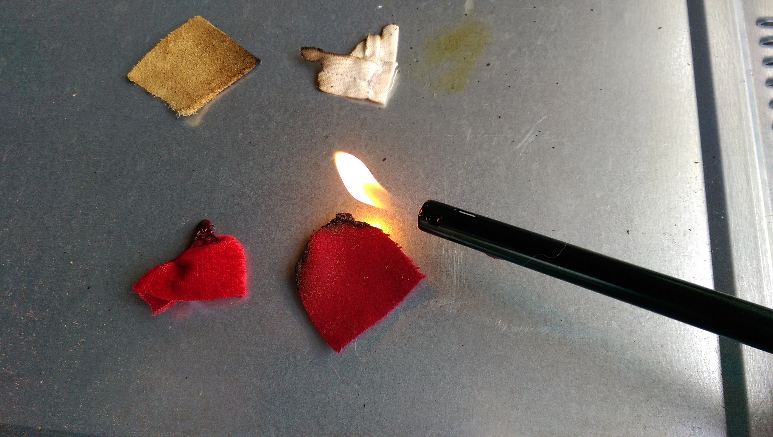 The leather barely burned, the cotton linen burned up completely, the wool smelled like burning hair, and the velvet burned into a shiny glob of plastic.