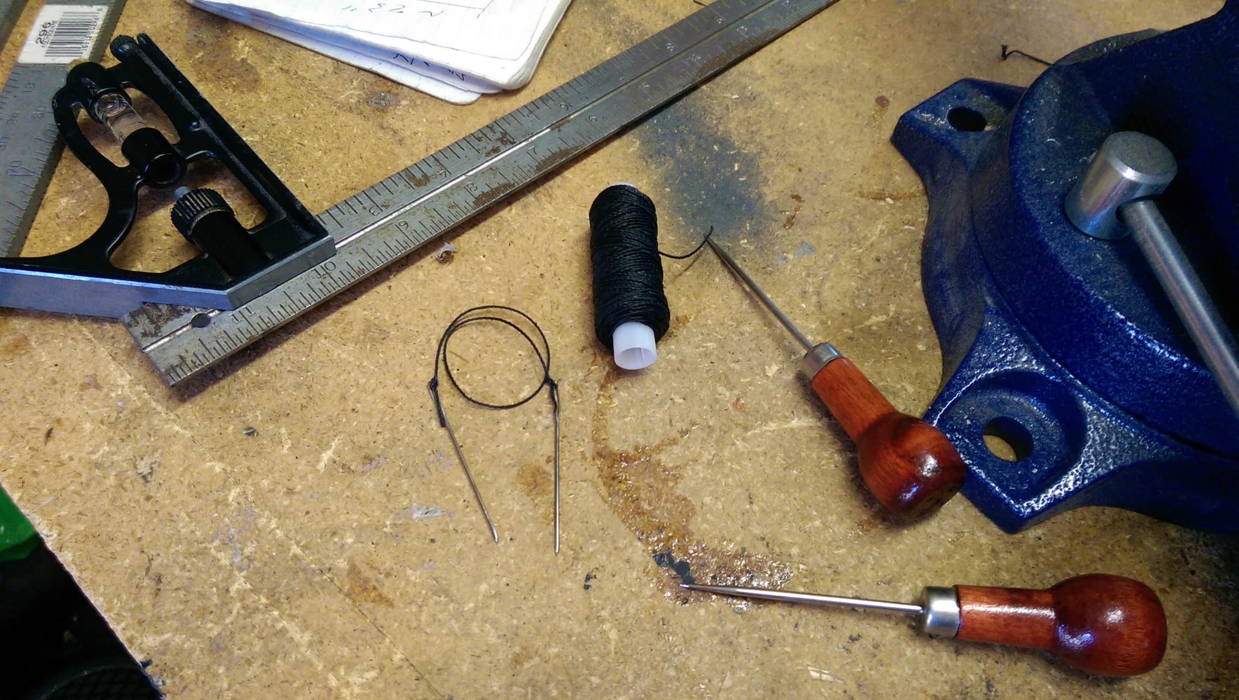The awls, cord, and stitching needles. I alternated between the two awls to keep them sharp longer (and they came as a set).