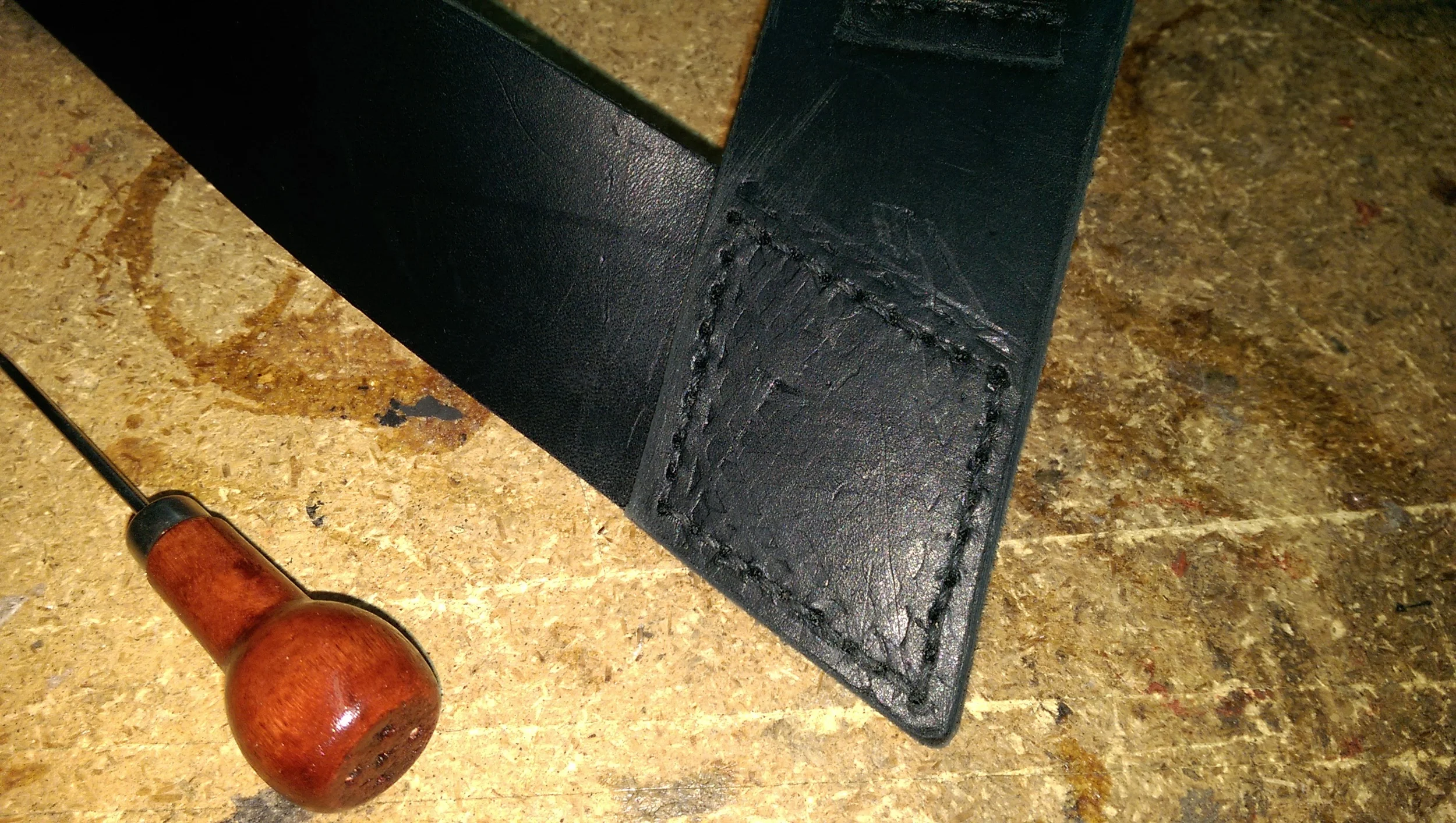 Stitching the two ends of the bandoleer strap together