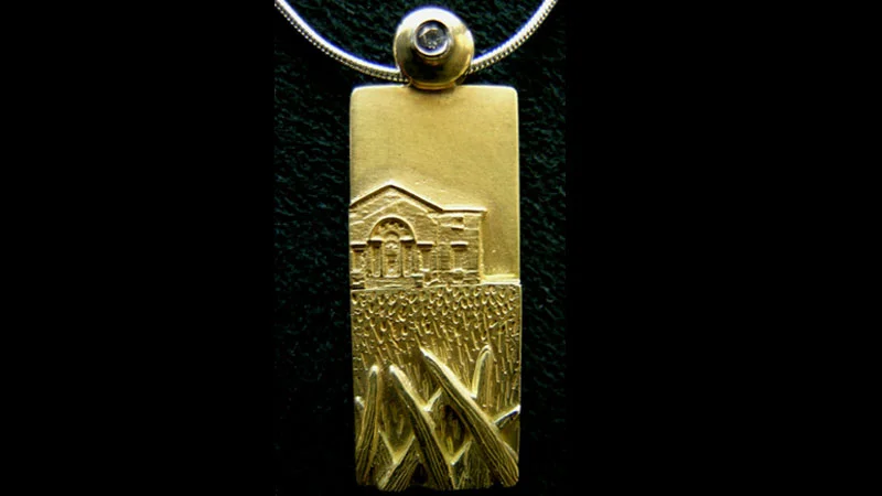 One of a kind bas-relief in 18 karat yellow gold.