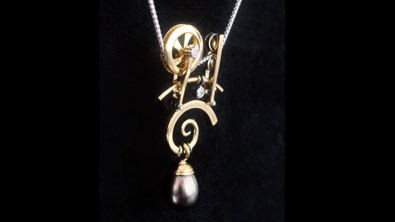 Mechanical black pearl pendant