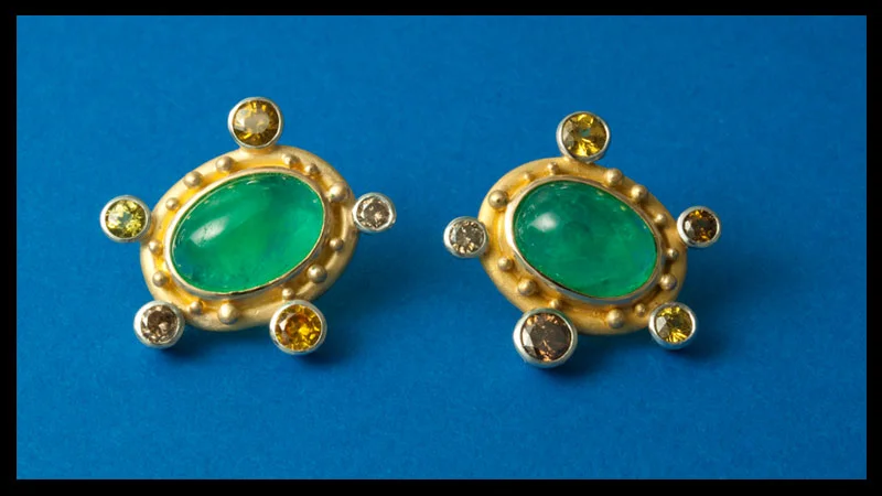  emerald earrings with natural colored diamonds