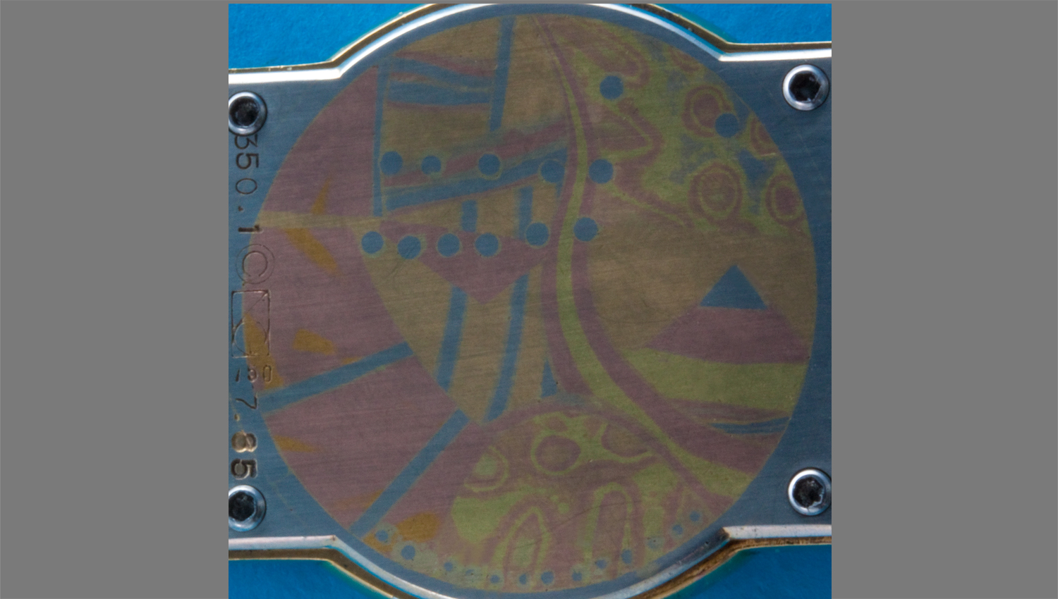 Abstracted Mona Lisa with Mt. Fuji. Wrist watch back 1985.