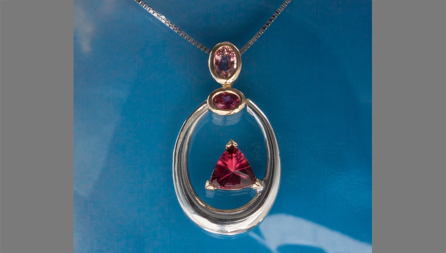 pendant with Mozambique Rubellite and oval Tourmalines.