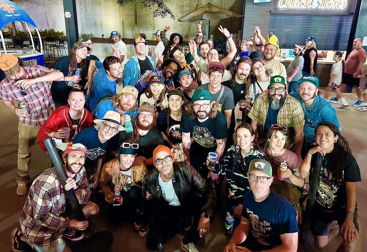 East Lake Brewery staff and volunteers share a craft beer for closing