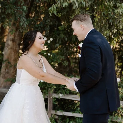 bride and groom hold hands as they delegate tasks to a Flagstaff wedding coordinator