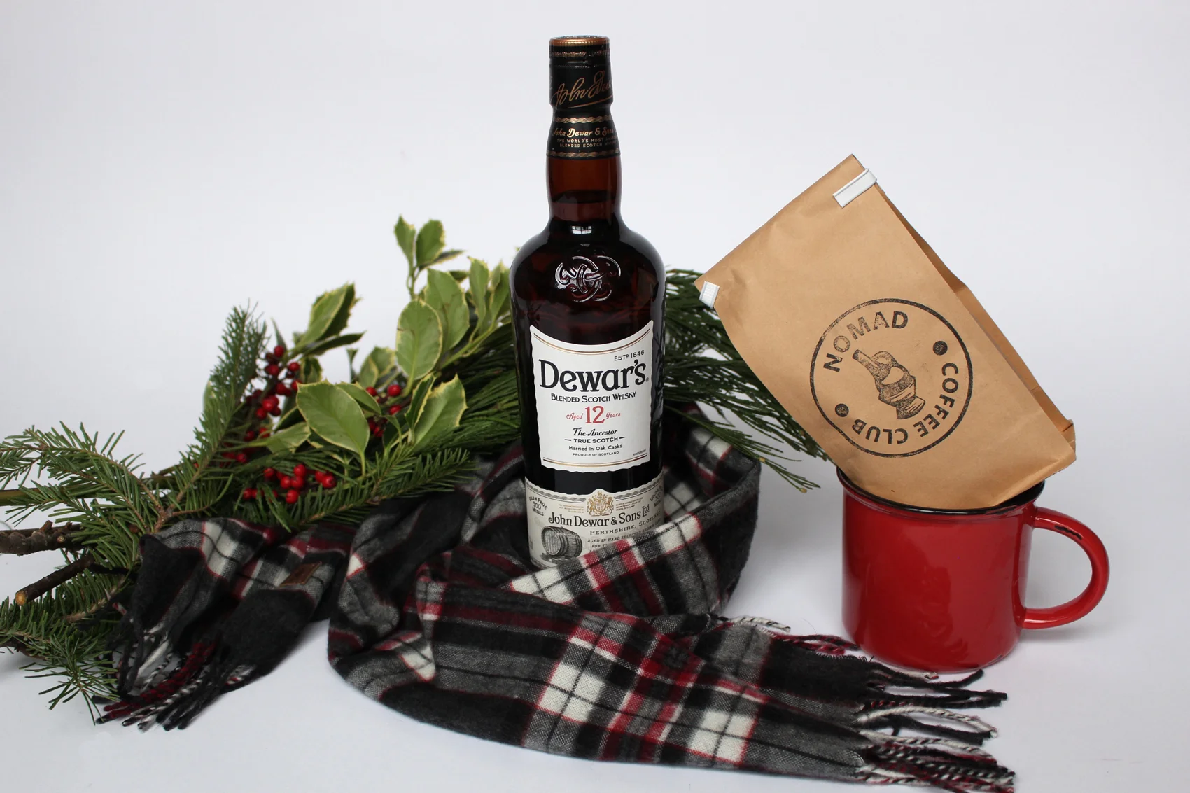 Dewar's 12 year old Scotch Whisky . Nomad Coffee Club subscription. Roots cotton plaid scarf ( similar here ). 
