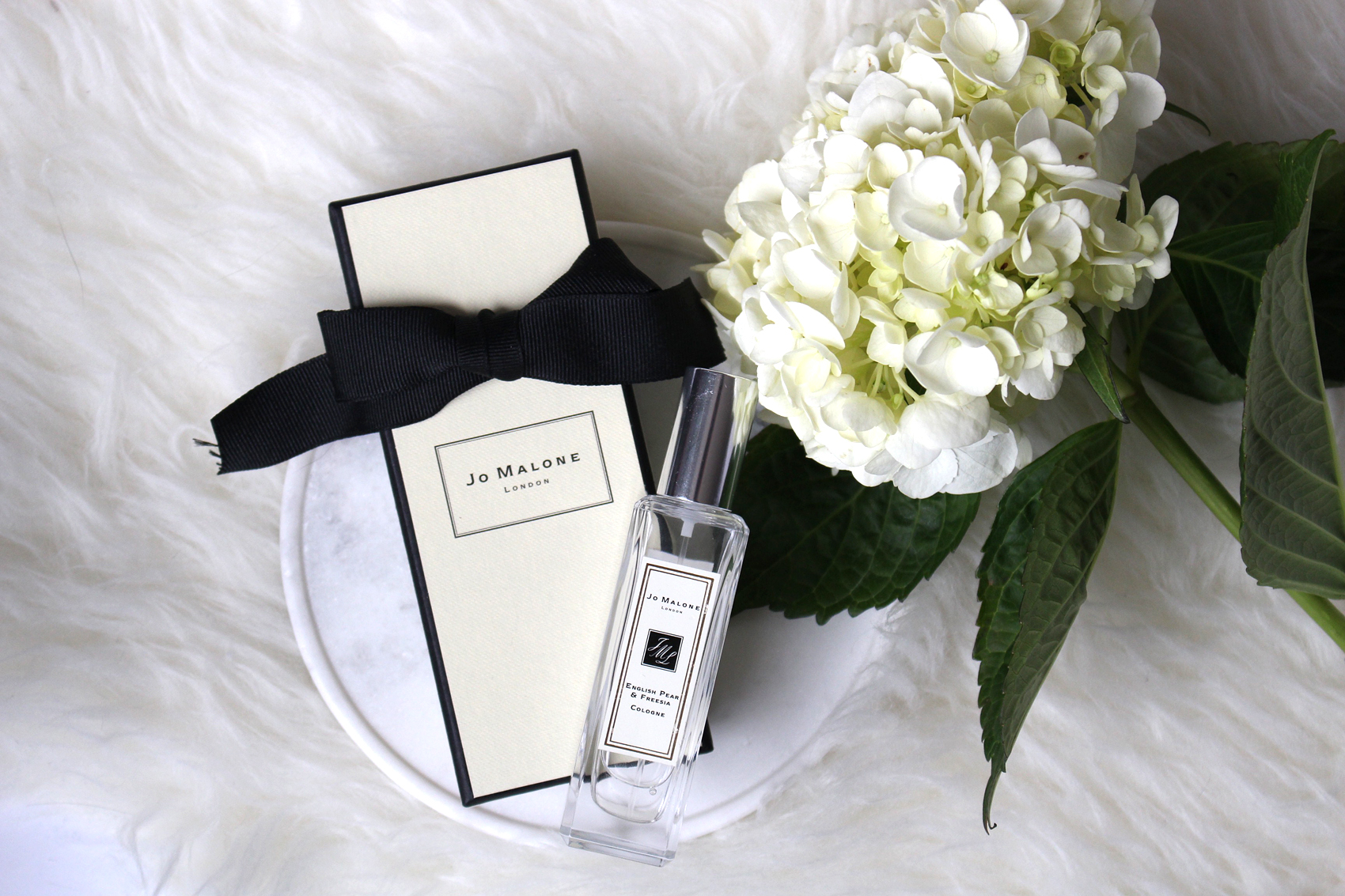 Jo Malone travel sized cologne in English Pear & Freesia.