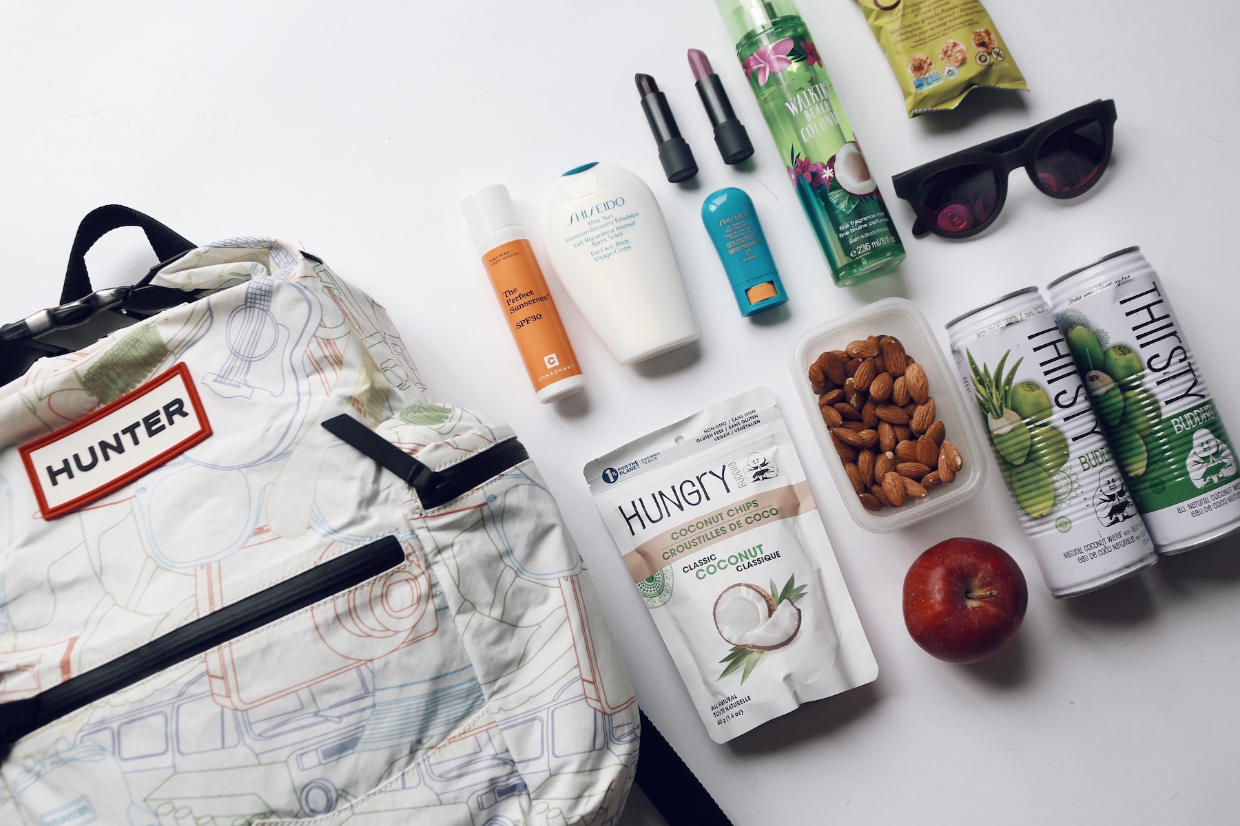Hunter backpack from SS16 jam packed with my festival essentials including aloe coconut water from Thirsty Buddha and coconut chips. I'm obsessed!