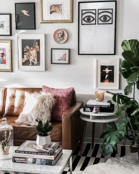 Instagram @_nathaliemartin - gallery wall, home, brown leather couch, olle eskell eye print, woahstyle.com.jpg