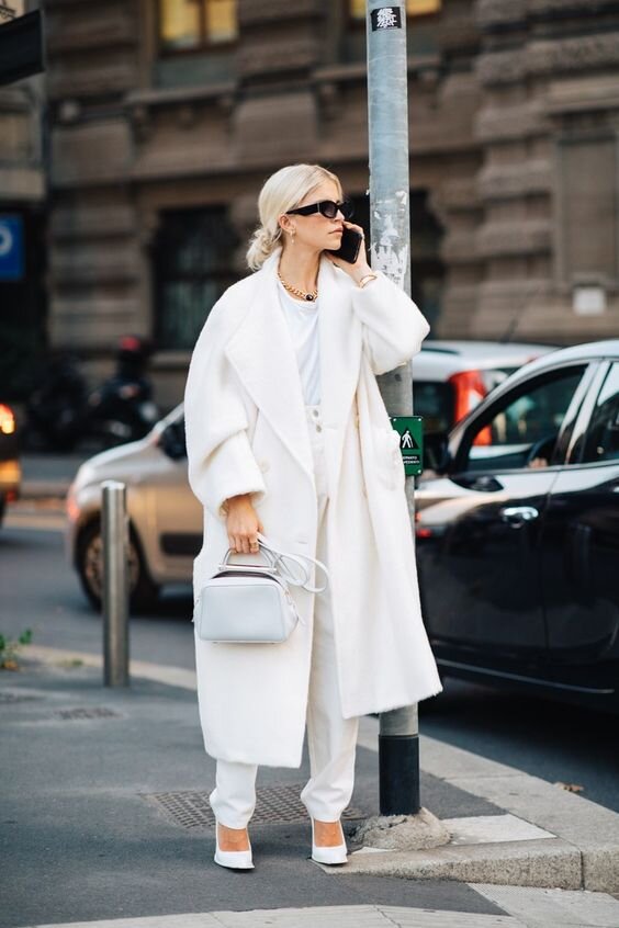 Instagram @_NathalieMartin, CLOSET ESSENTIALS Long Coats Everyone Should Have In Their Closet - Cara Daur wearing winter white coats street style,  woahstyle.com.jpg