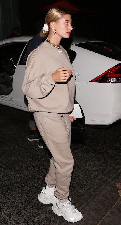 The Best of Hailey Bieber street style wearing Balenciaga white track sneakers tan beige Essentials sweatpants and sweatshirt white scrunchie Hailey Baldwin, woahstyle.com.jpg