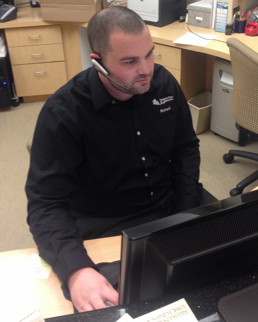 Our office manager, Michael. hard at work taking phone calls. 