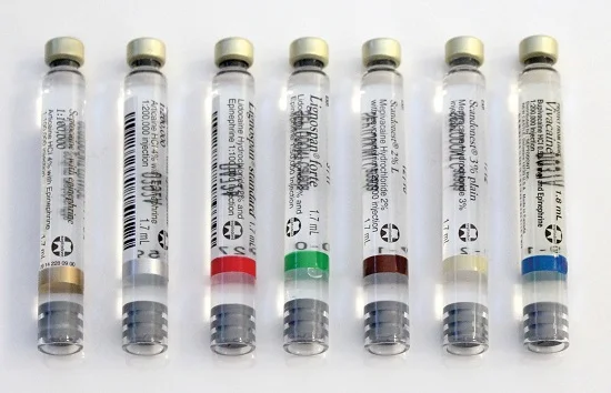 Dental anesthesia is packaged into carpules like these. The sizes and coloring is standardized to prevent any confusion between manufacturers. 