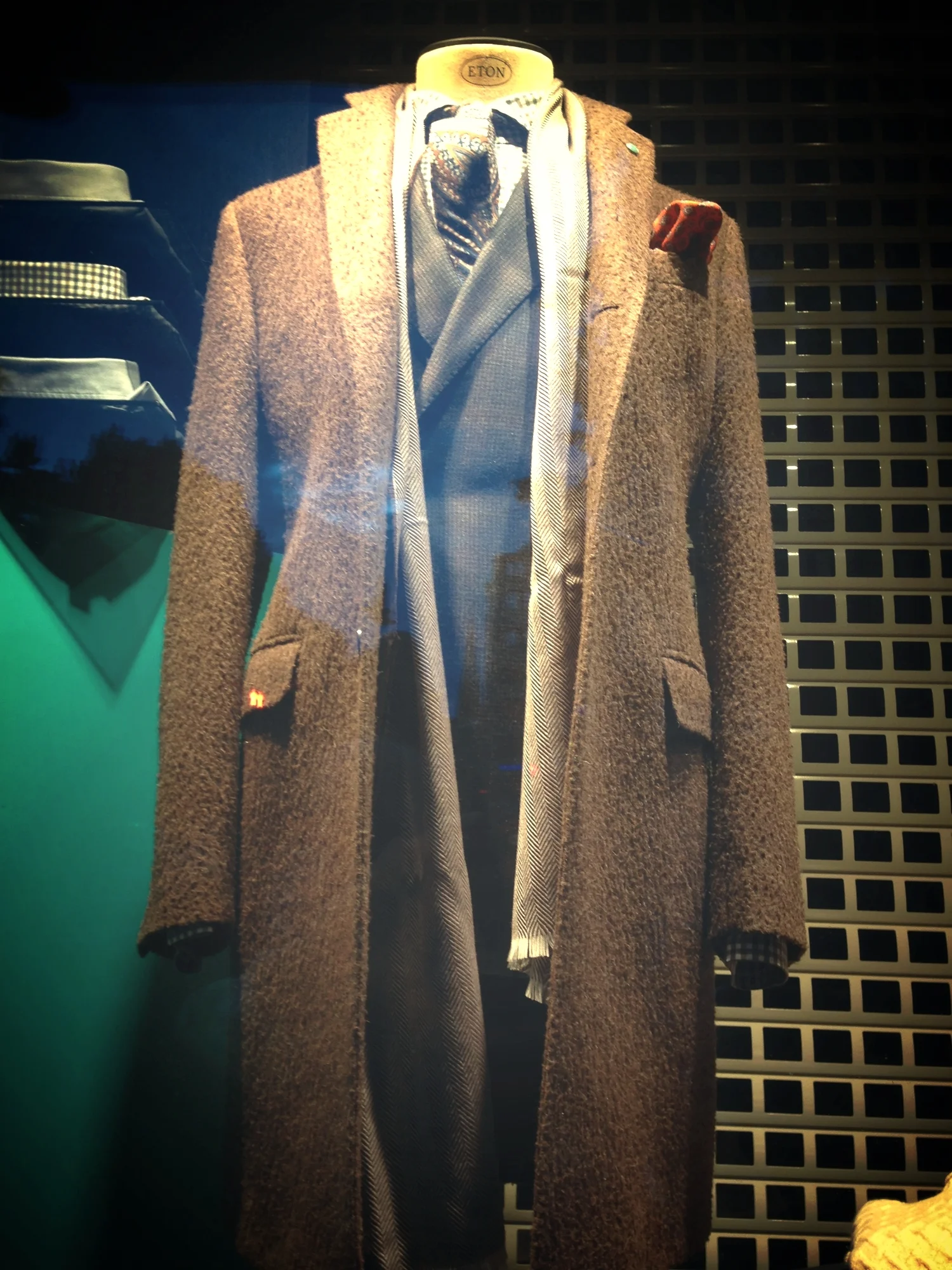 LOVE how the pocket square is also used to accent a coat.
