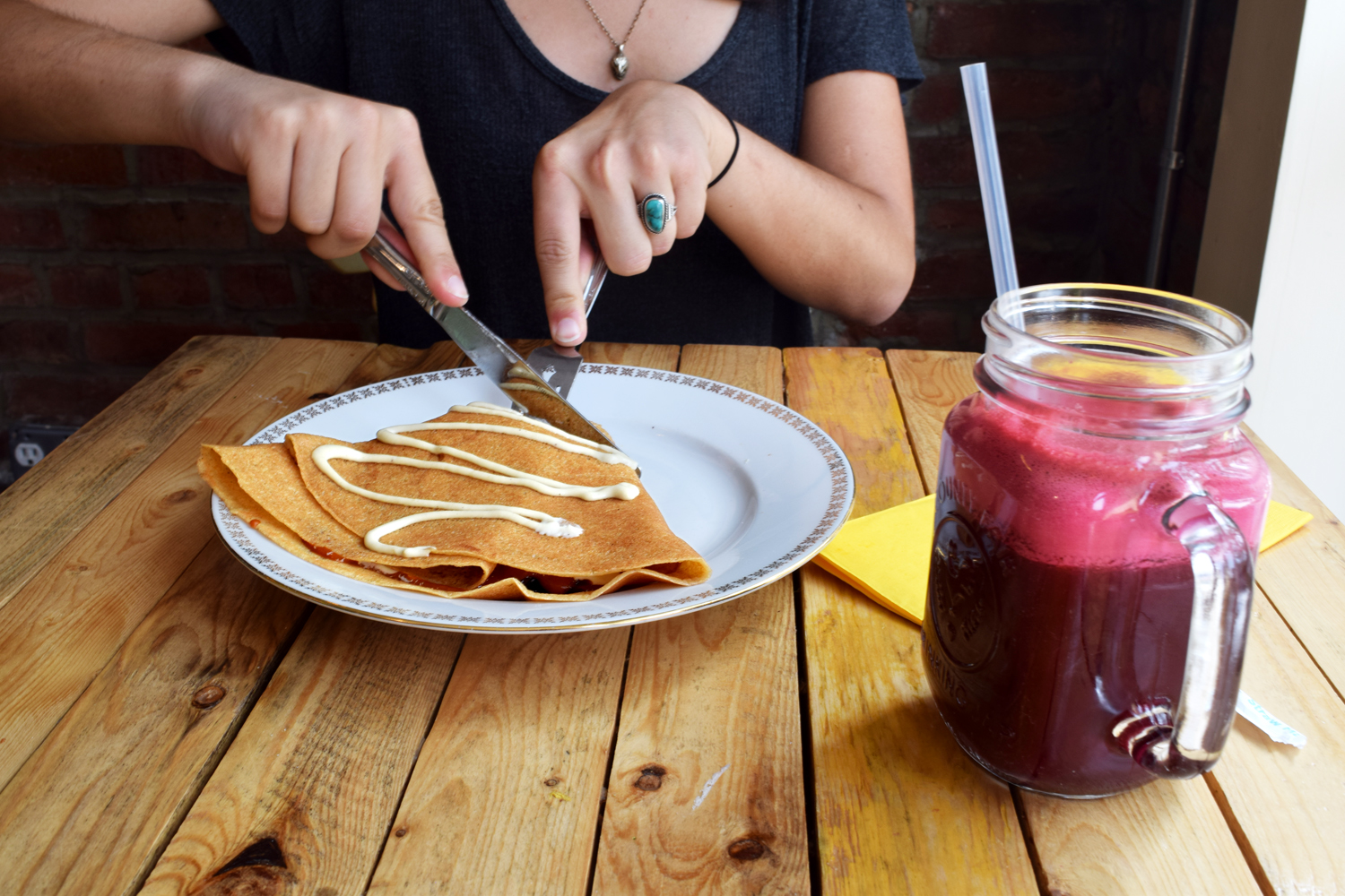 The delicious pizza crepe (made with house-made cashew creme) & a beet-ginger juice at Little Choc Apothecary.