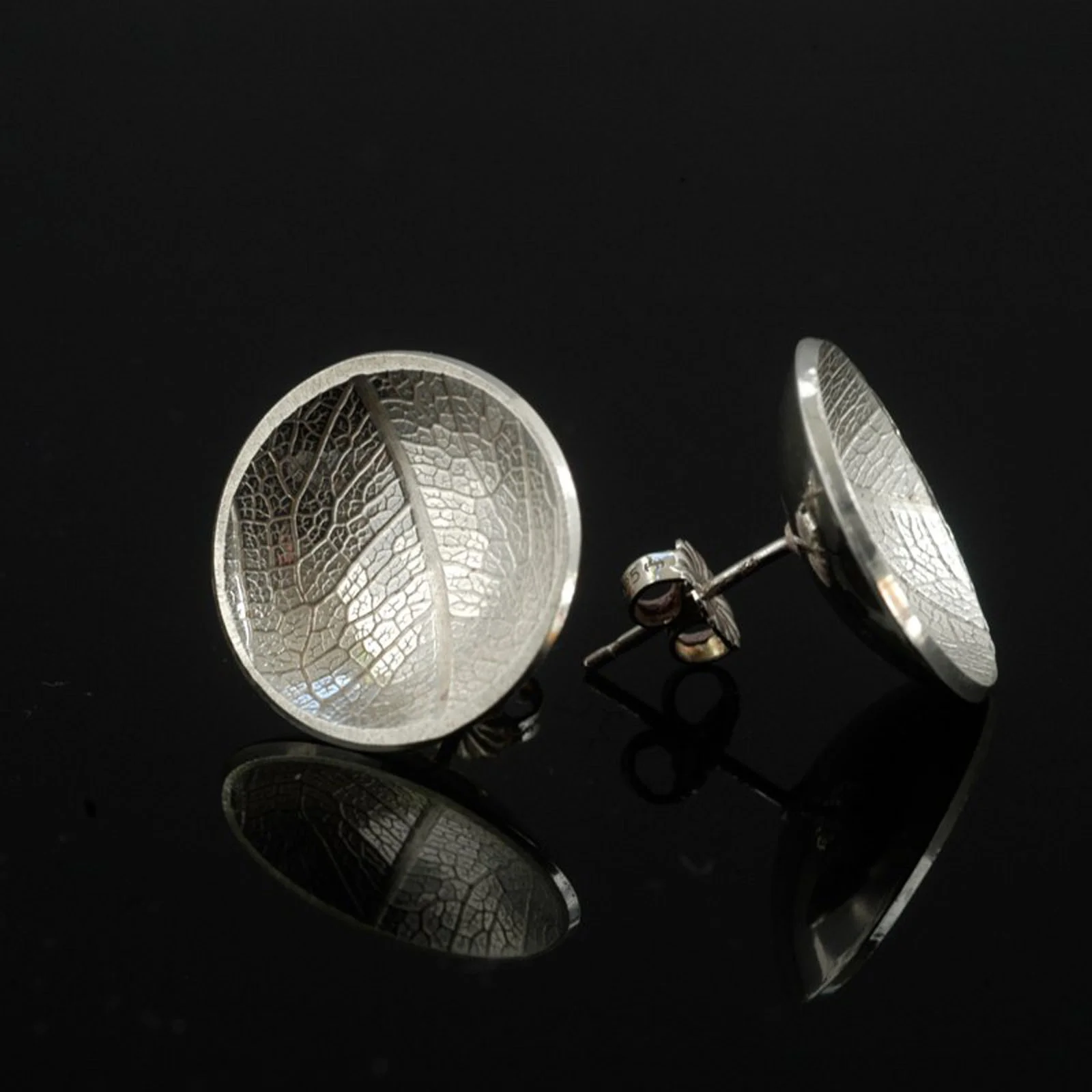Textured Silver stud earrings 2pm-6pm sunday Learn how to Cut metal and texture with printing and hammer techniques. Form them to the shape you would like to wear. Have a go at silver soldering and while you enjoy tea and cake your design will be polished ready for you to wear your unique Design Home. £55 per person Minimum 2 max in class 5
