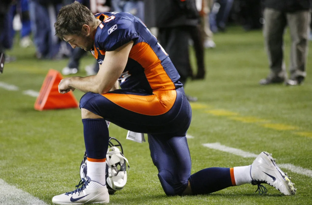 Tebow Kneeling.jpeg