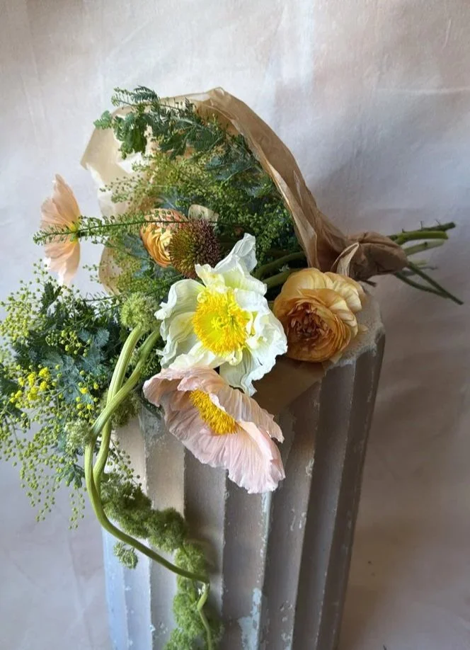 a large, hand-tied bundle for valentines day in a bright color palette