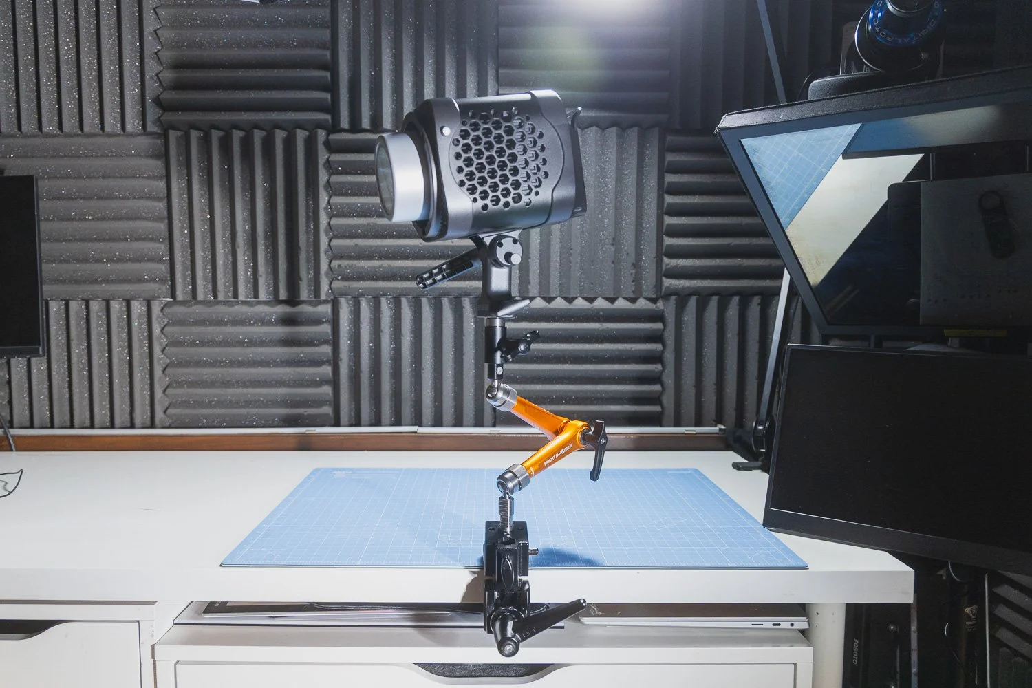 Bright Tangerine Titan Arm 2 Ti with Amaran 300X mounted