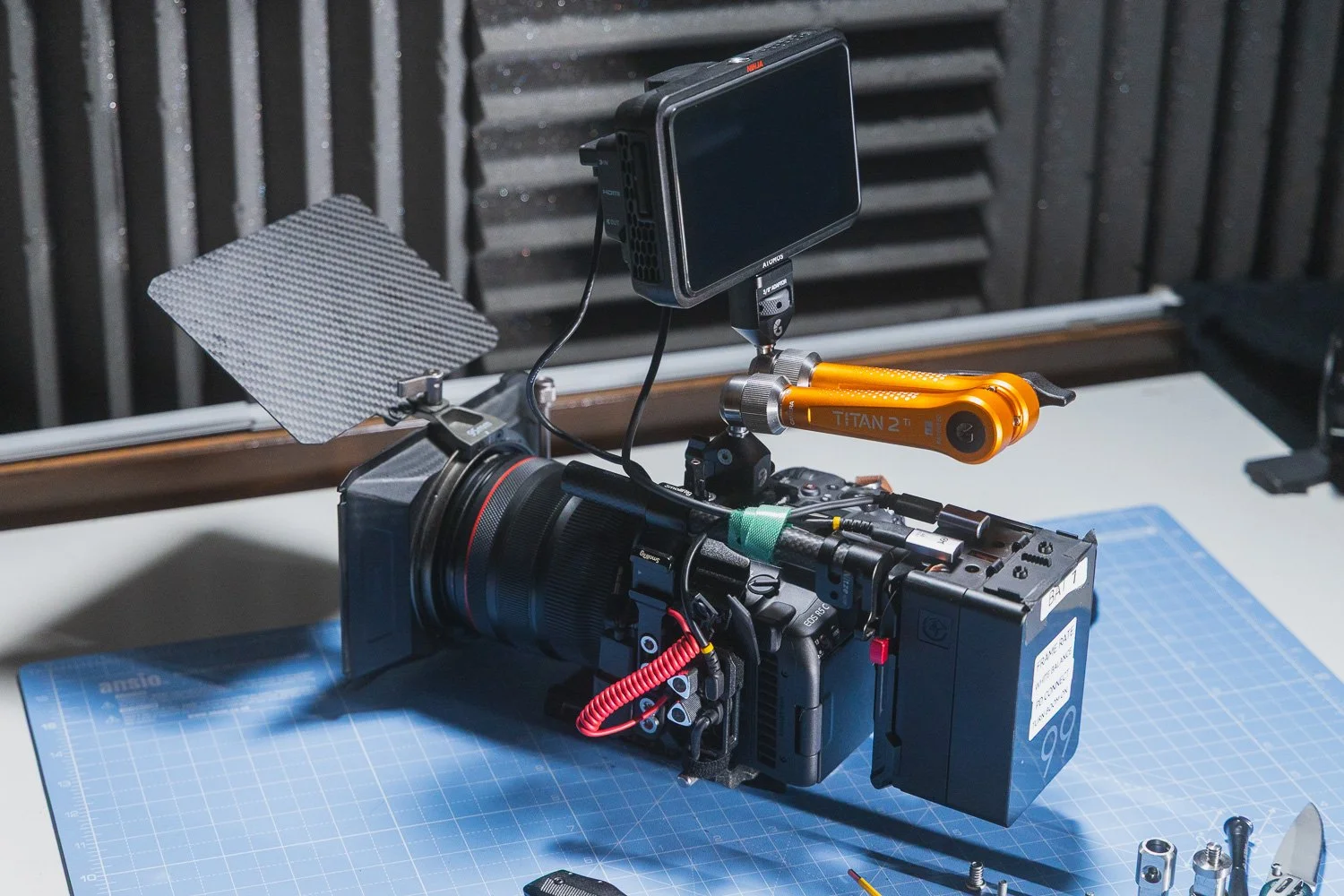 Canon R5C with Bright Tangerine Titan Arm 2 Ti as monitor mount