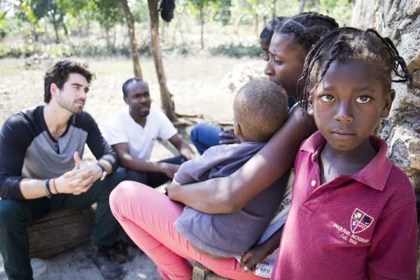 Chatting with a local family; Photo by Crystal Wells