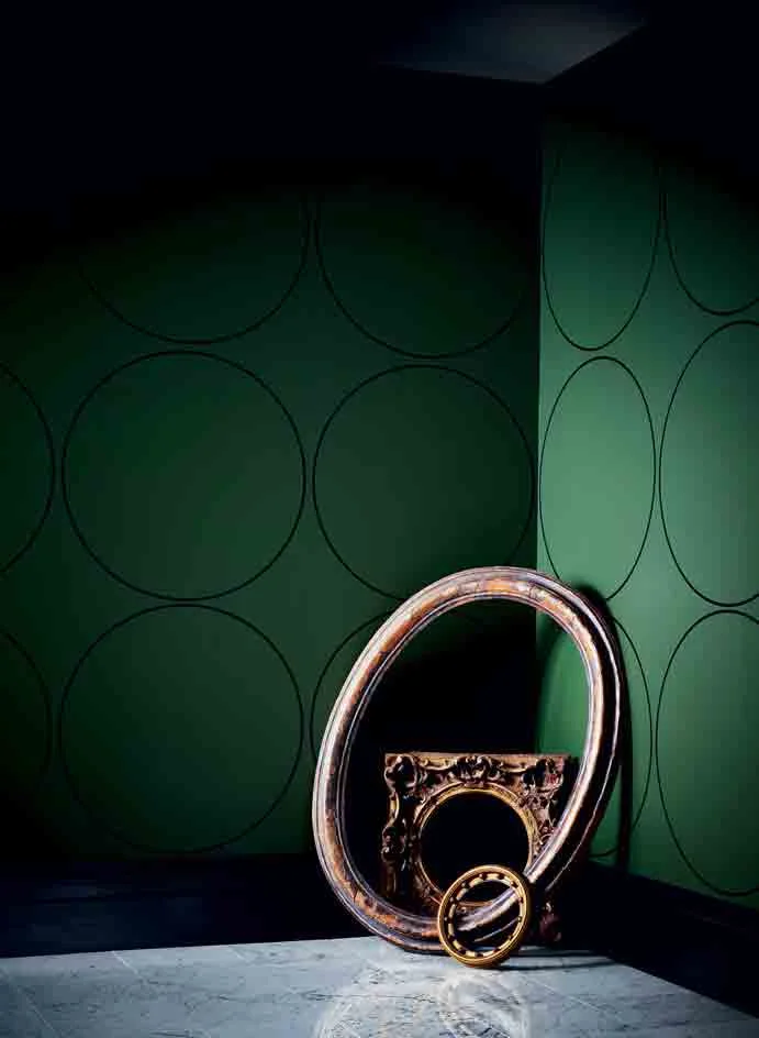 ‘Circle Cutter’s Room’ wallpaper by Rosemarie Trockel with 18th-century Italian oval moulding frame; Circa 1740 French Louis XV frame with round opening; 19th-century American Scotia profile frame with applied balls, all from Gill & Lagodich Gallery.