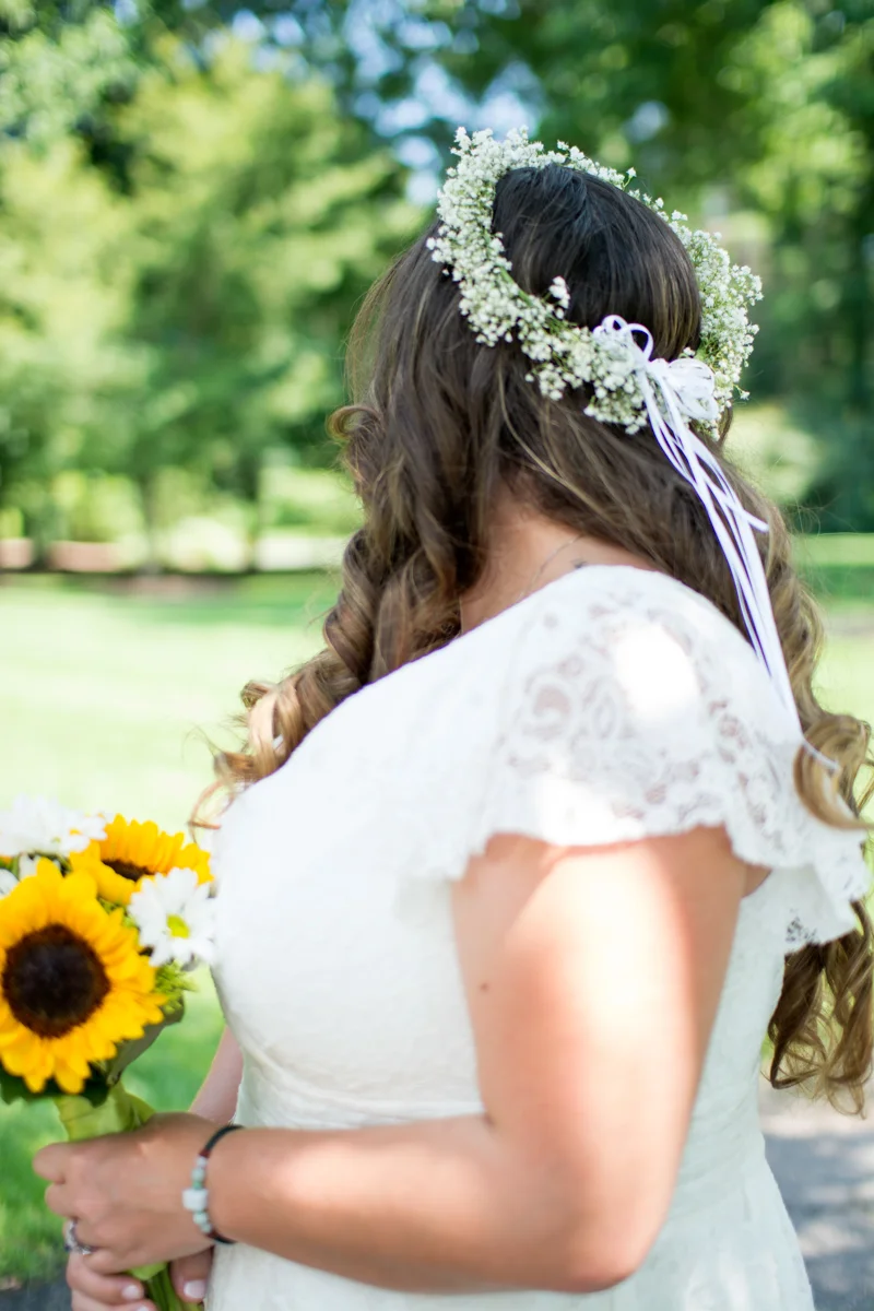One way to make your DIY hairstyle stand out? Leave it loose and dress it up with a flower crown! I loved the sweet summery vibe Nicole's baby's breath crown gave her hairstyle.