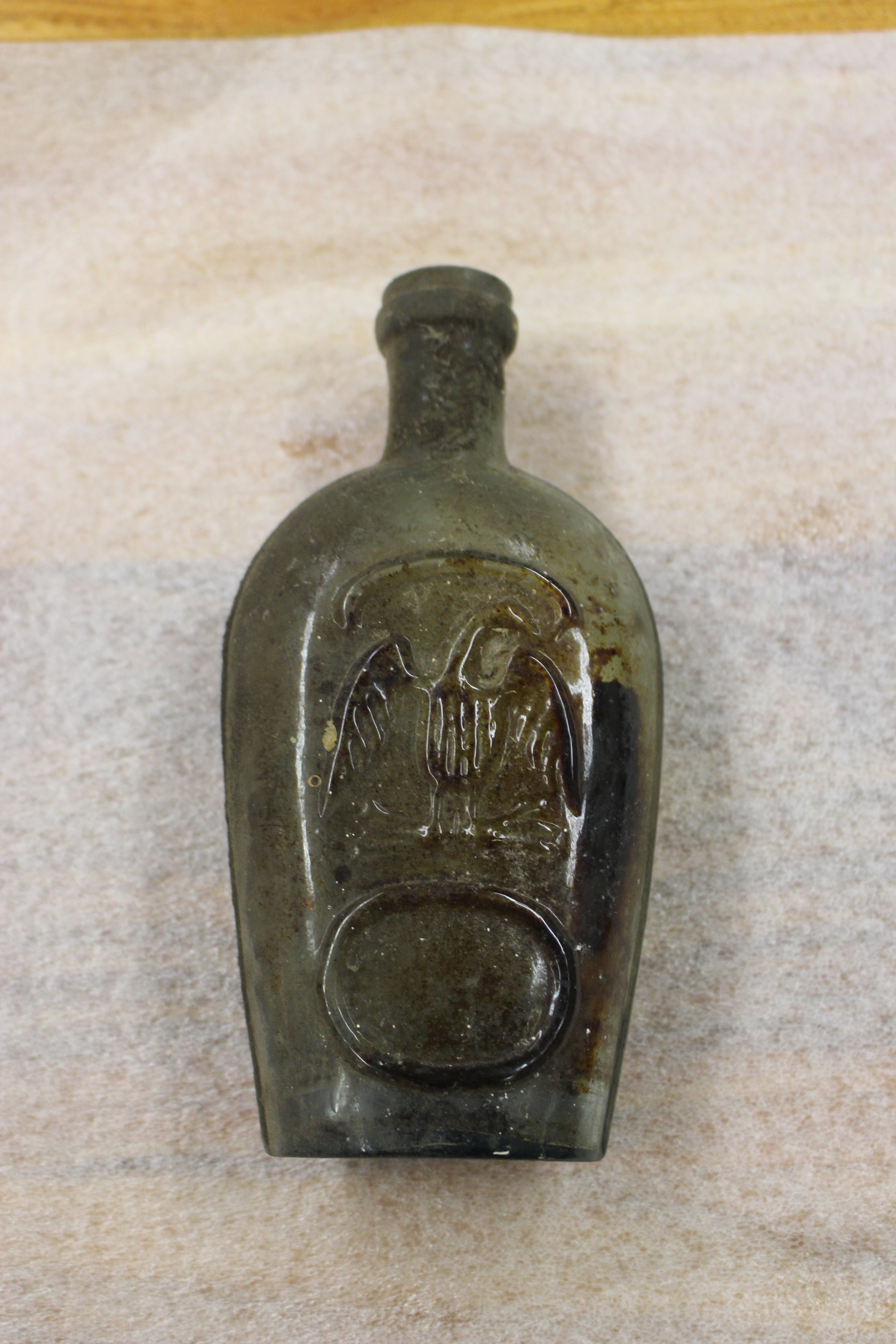 Flask Bottle that fell out of an eave during exterior restoration