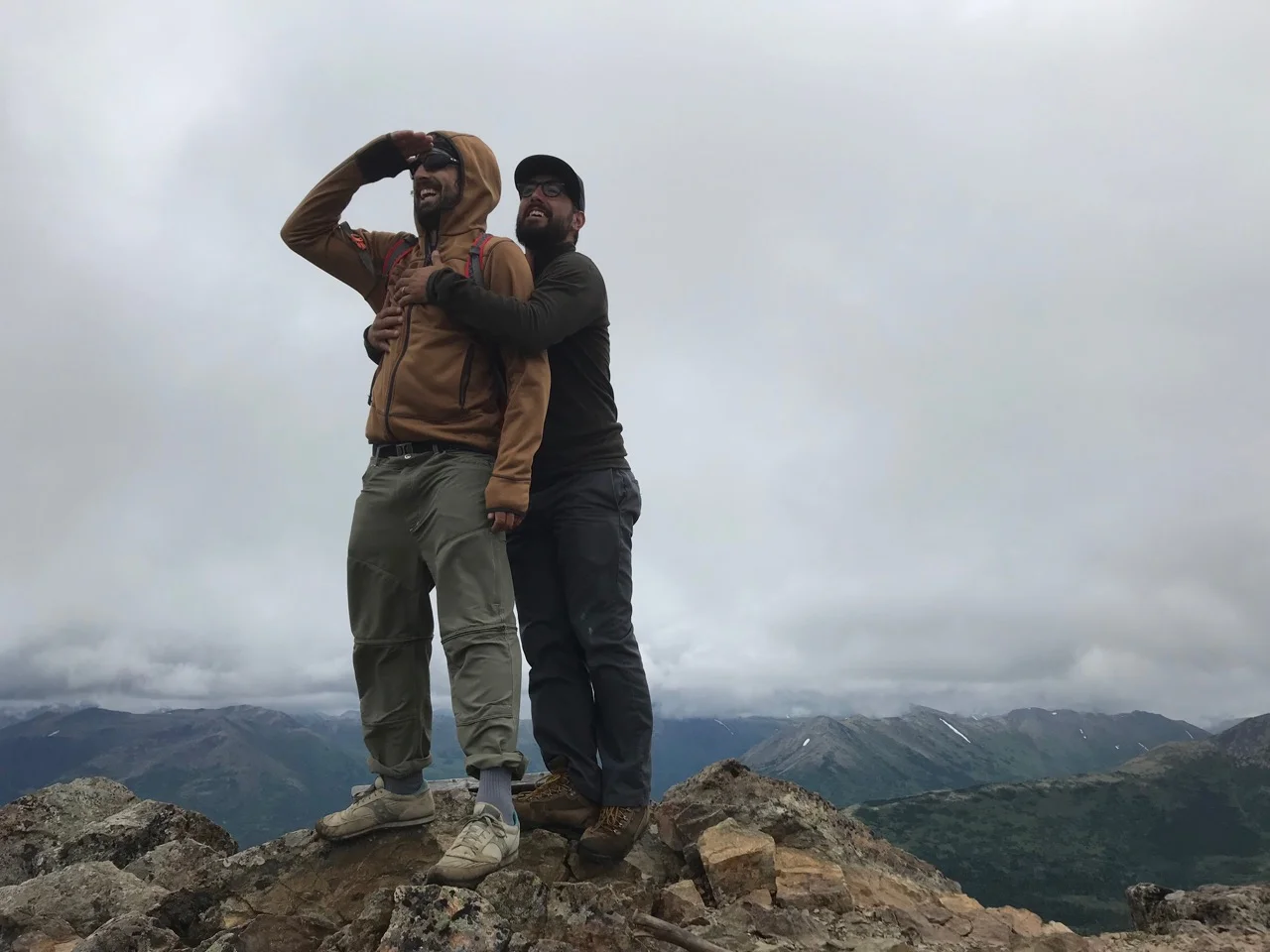My brother and I share a joyous embrace on the summit.