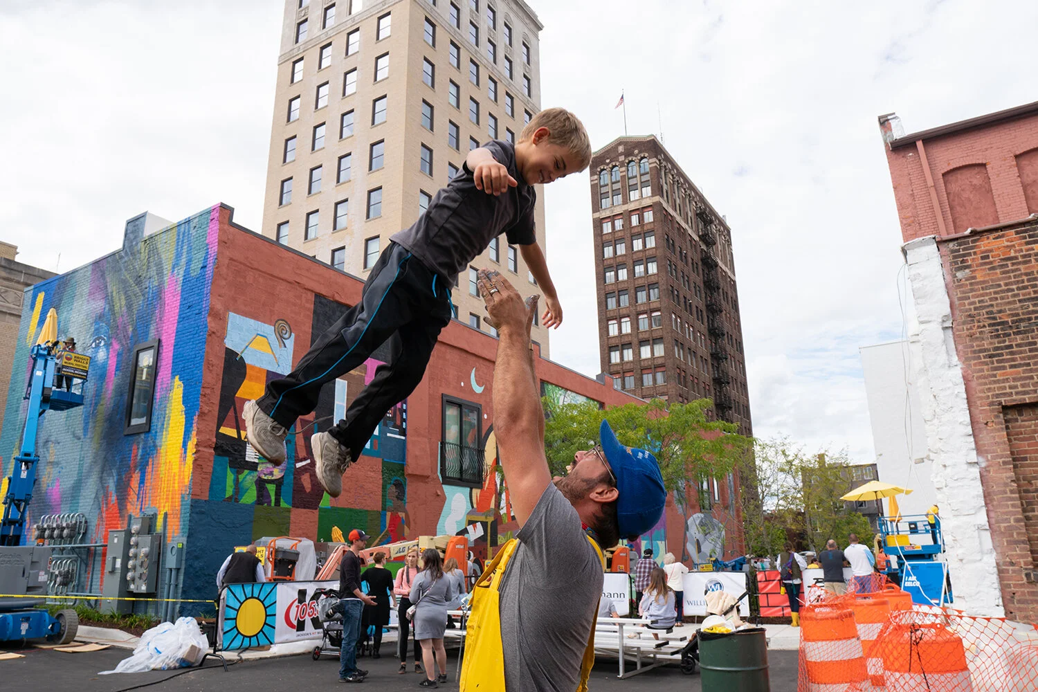 The Blake Building (dark brown brick) towers in the background. | Photo Credit: Owley @ow.ley